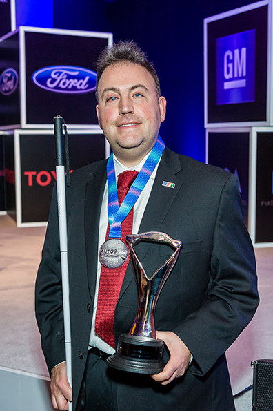 Mark Riccobono poses with the award.