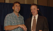 Erik Weihenmayer shaking hands with Dr. Marc Maurer.