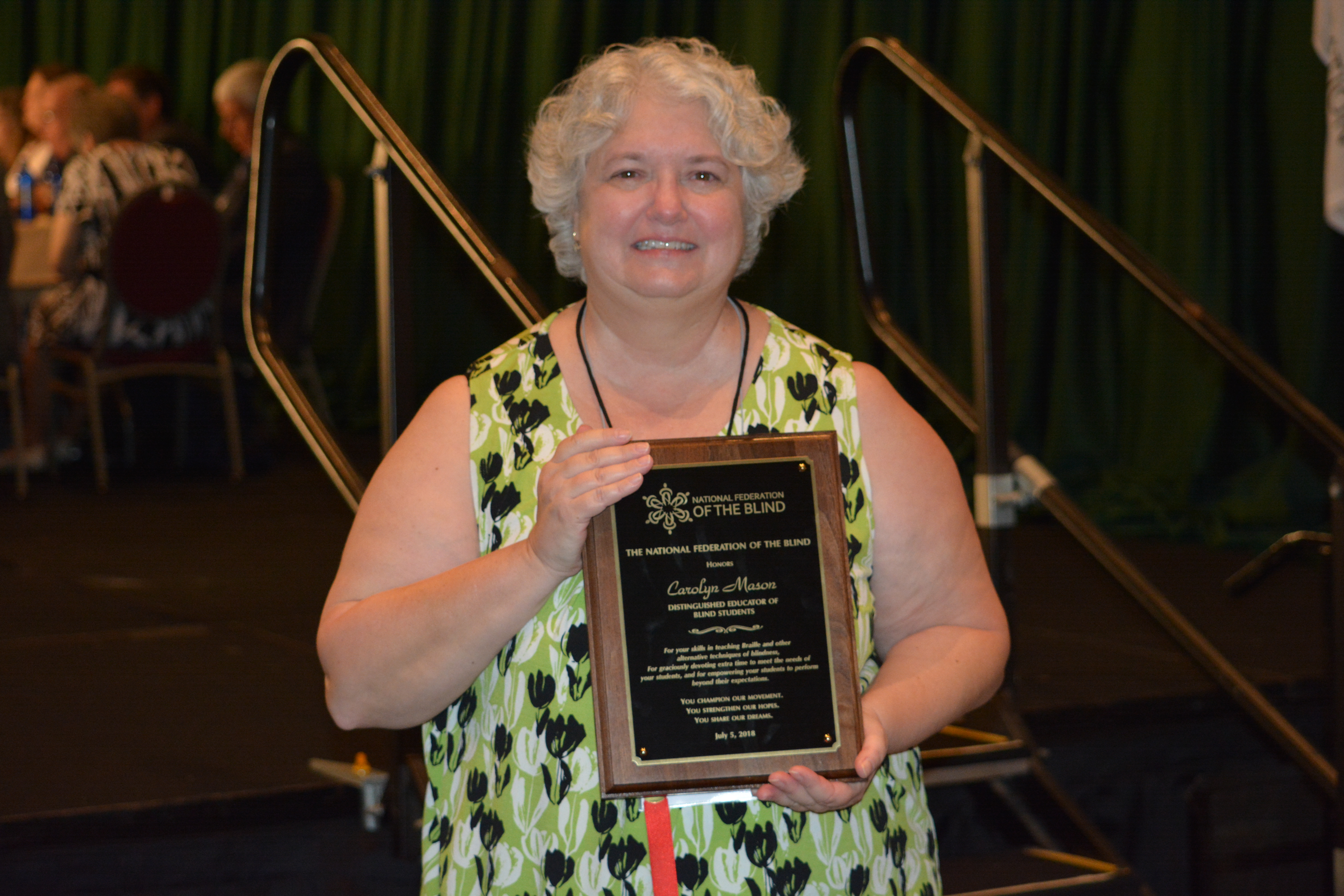 Carolyn Mason receives the Distinguished Educator of Blind Students Award.