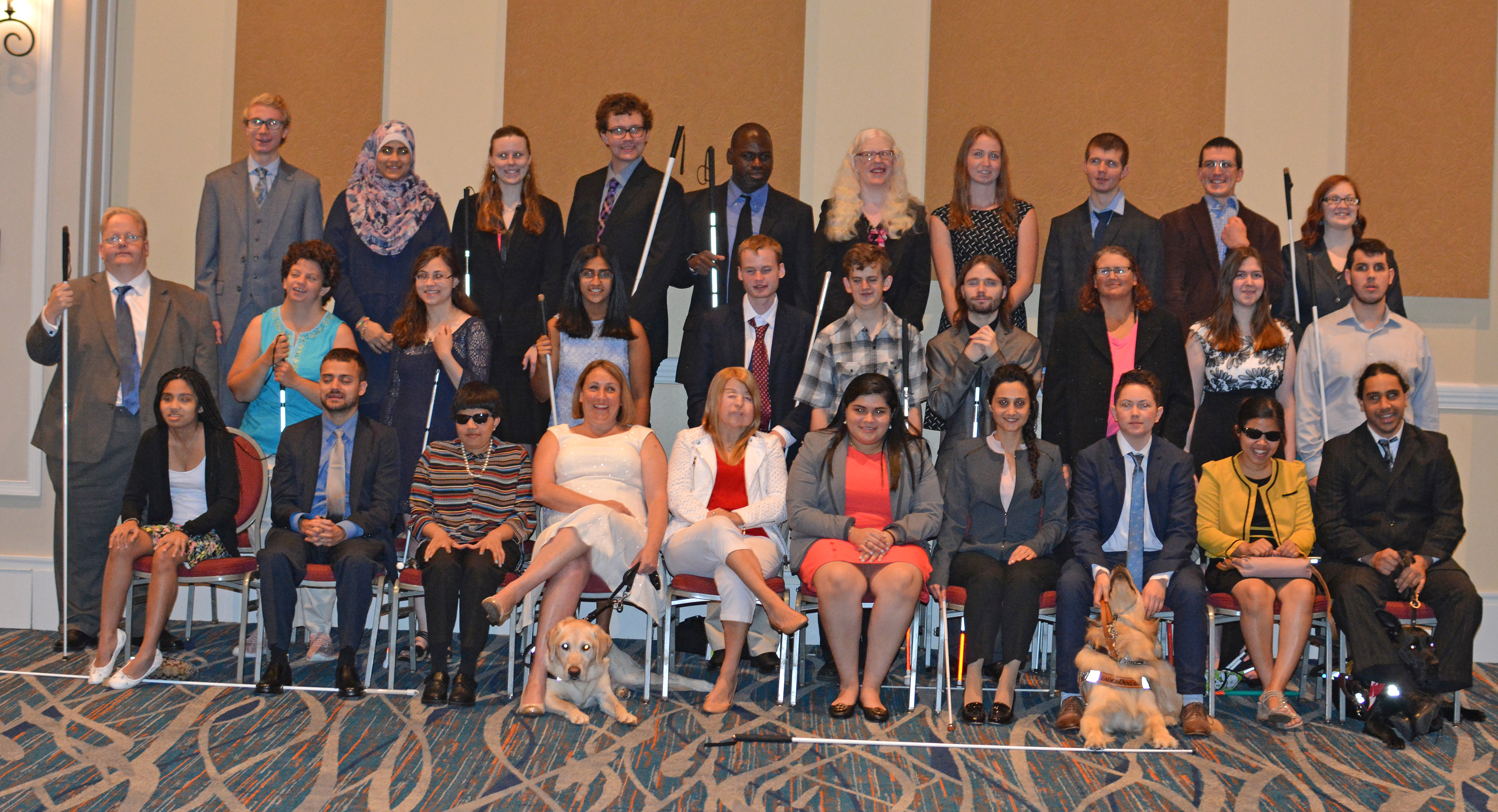 The 2018 NFB Scholarship class. Back row, left to right: Matthew Turner, Tasnim Abdulsalam Alshuli, Elizabeth Rouse, John E. Harrison, Tyron Bratcher, Chrys Buckley, Paige Young, Shane Lowe, Eric J. Harvey, Sarah Beth Patnaude. Middle row, left to right: Harry Staley, Jr., Sara LaVel Mornis, Yasmine Marie Sarraf, Trisha Kulkarni, Justin Heard, Seth Lowman, Jeff Humphrey, Cathy Tuton, Olivia Charland, Naim Muawia Abu-El Hawa. Front row, left to right: Alexandra Florencia Alfonso, Connor James Mullin, Purvi Contractor, Amanda L. Lannan, Caitlin Sarubbi, Kenia Flores, Ozgul Calicioglu, Rilee Sloan, Menuka (Jyoti) Rai, Millad Bokhouri.