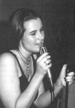 Jennifer White is pictured singing a song in the Showcase of Talent.