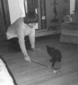 Peggy Elliott playing with her cat