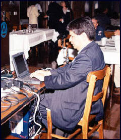 Curtis Chong working on his laptop.