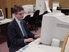 Steve Booth uses a computer.
