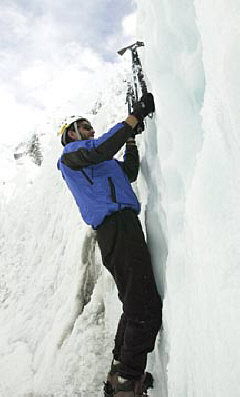 Erik Weihenmayer climbs an ice face.