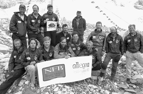 The National Federation of the Blind-Allegra 2001 Everest team holds up the expedition banner.
