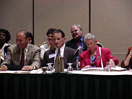 Jim Gashel, President Maurer, and Sharon Manecki sit at the Resolutions Committee meeting. 