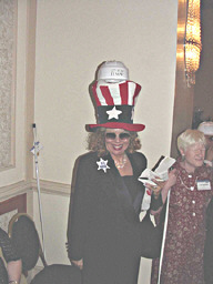 Marie Cobb wearing an American flag tophat with her hardhat on top.