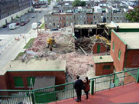 The demolition site on day four.   President and Mrs. Jernigan inspect the progress from the Skydeck.