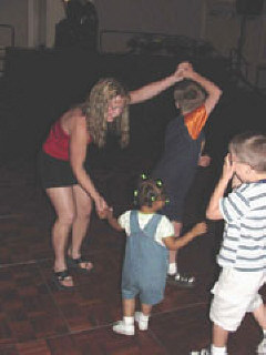Federationists of all ages including the very young enjoy dancing at hospitality night.