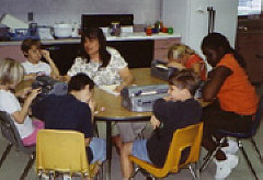 Caroline Rounds works with her class.