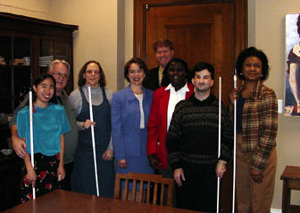 Donna Hartzell, NFB of Arkansas first vice president (third from the left), and other affiliate members meet with Senator Blanche Lambert Lincoln (center).
