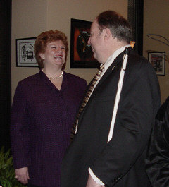 Senator Debbie Stabenow entertains Fred Wurtzel, president of the NFB of Michigan, and other affiliate members at her morning breakfast