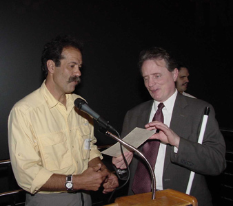 Everest team leader Pasquale Scaturro presents Dr. Maurer with the actual permit issued by the Nepal authorities to the NFB 2001 Everest Expedition.