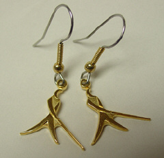 Whozit earrings, gold $25; sterling silver, $20