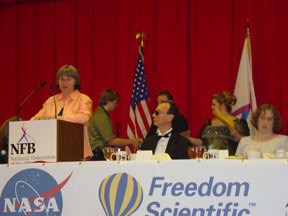 Peggy Elliott announces the winners of the 2003 scholarships.