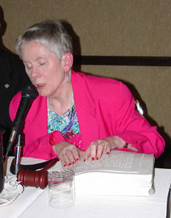 Sharon Maneki reads a resolution to the committee on Sunday afternoon.