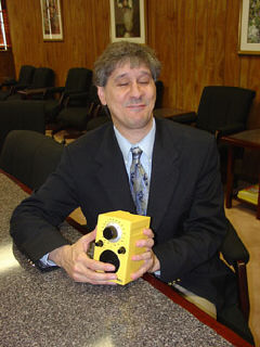 Brad Hodges holds the Tivoli Portable Audible Lab (PAL).