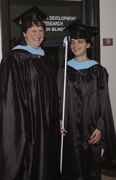 Kaye Bullard and Brook Sexton in academic regalia