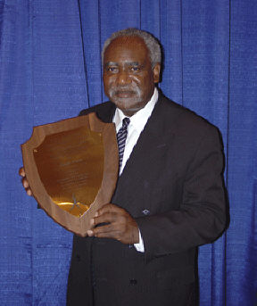Congressman Danny Davis displays his plaque.
