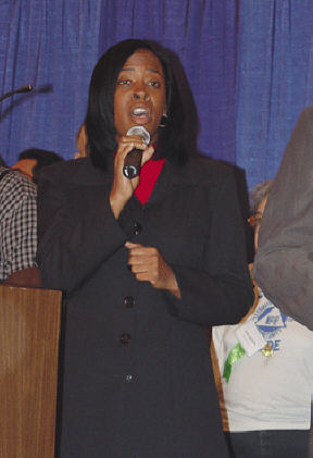 Michelle Gittens sings "God Bless America".