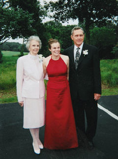 Kimberley Aguillard stands between her grandparents.