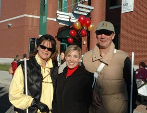 Betsy Zaborowski, Jernigan Institute executive director, stands with Mindy Basara, a TV anchor for Baltimore.s NBC TV station, and Jim Gashel, NFB.s director of strategic initiatives.   Mindy served as honorary chairperson of the NFB-Riverside Fall Festival and White Cane Walkathon.