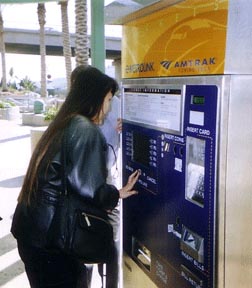 Federationist Racquel Decipeda uses the new talking ticket-vending machine.