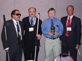 Pictured here (left to right) are Joe Cordova, Kevan Worley, Terry Smith, and Jim Gashel.  Terry Smith holds his Gold Star.