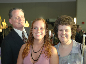 President Maurer with daughter Diana and wife Patricia.