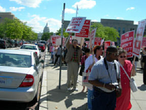 The picket line on the Maryland Avenue side of the Department of Education in Washington, D.C., began forming shortly after ten a.m. on Thursday, May 26.  Disabled people, rehabilitation professionals, and other concerned citizens from as far away as Hawaii gthered to register their dismay st the Bush administration's plan to dismantle the country's rehabilitation program in the name of efficiency and cost-cutting.