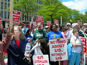 At noon Thursday the crowd gathered to chant and cheer in front of the platform before settling down to listen to speakers.