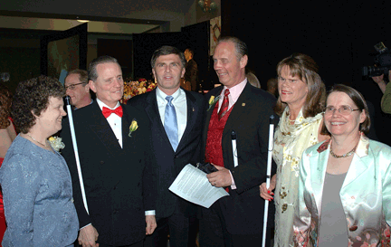 Left to right are Pat Maurer, Marc Maurer, Maryland Governor Robert Ehrlich, Jim Gashel, Betsy Zaborowski, and Mary Ellen Jernigan.