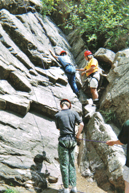 Colorado Center for the Blind students take advantage of the presence of the Rocky Mountains at their back door. Here two students learn to climb a rock face.