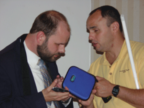 Mike Tindell demonstrates an accessible PDA.