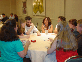 A group of students enjoys cards at Monte Carlo Night.