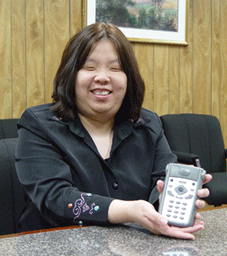 Anne Taylor holds the Icon.
