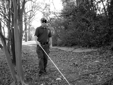 Sometimes the sidewalk deteriorates almost into nonexistence. Here Adam confidently picks his way across the no-man�s-land.