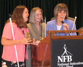 Julie Deden, Shawn Mayo, and Pam Allen jointly acknowledge their centers’ Bolotin Awards.