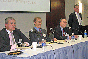 Robert Burgdorf, John Kemp and Andrew Imparato make up panel IV.&nbsp;Dr. Maurer stands to their right.