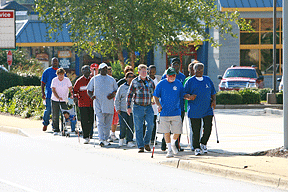 Members of the Anderson Chapter of the NFB of South Carolina participate in a White Cane Safety Day walk on October 11 to raise money for their chapter. (Photo courtesy of Ken Ruinard, Independent-Mail, S.C.)
