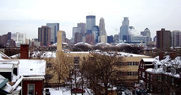 A cityscape of Minneapolis as seen from the roof of the Pillsbury mansion