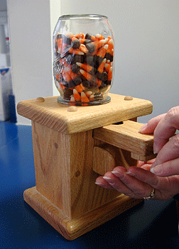 Handcrafted wooden candy dispenser