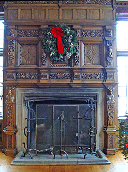 The carved oak fireplace in the parlor.