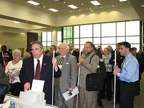 Attendees stood patiently in line waiting for their turn to purchase coins.