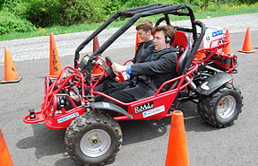 Mark Riccobono operates Virginia Tech’s prototype of a car that blind people can drive.