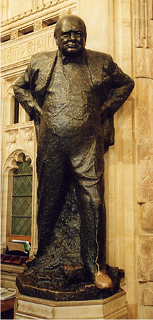 This famous statue of British Prime Minister Winston Churchill is located in the Members� Lobby at the left of the door into the House of Commons chamber. Its foot is noticeably warn because rubbing it is supposed to bring luck to MPs entering the chamber. Parliamentary copyright images are reprinted with permission of Parliament.