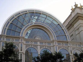 The Royal Opera House is located in Covent Garden, made famous before its transformation into an upscale shopping plaza, as the produce market where Eliza Doolittle sold flowers at the opening of My Fair Lady.