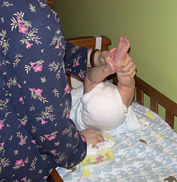Leslie Hamric changes Michael�s diaper