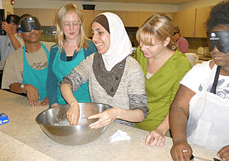 Students mix thier ingredients.